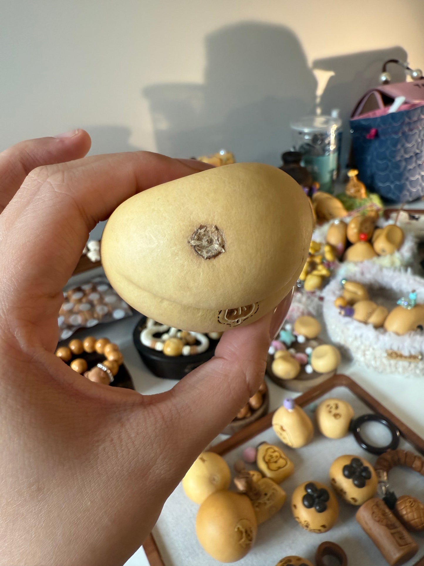 Hand-polished bread-shaped gourd โ warm color and soft texture, like freshly baked bread.