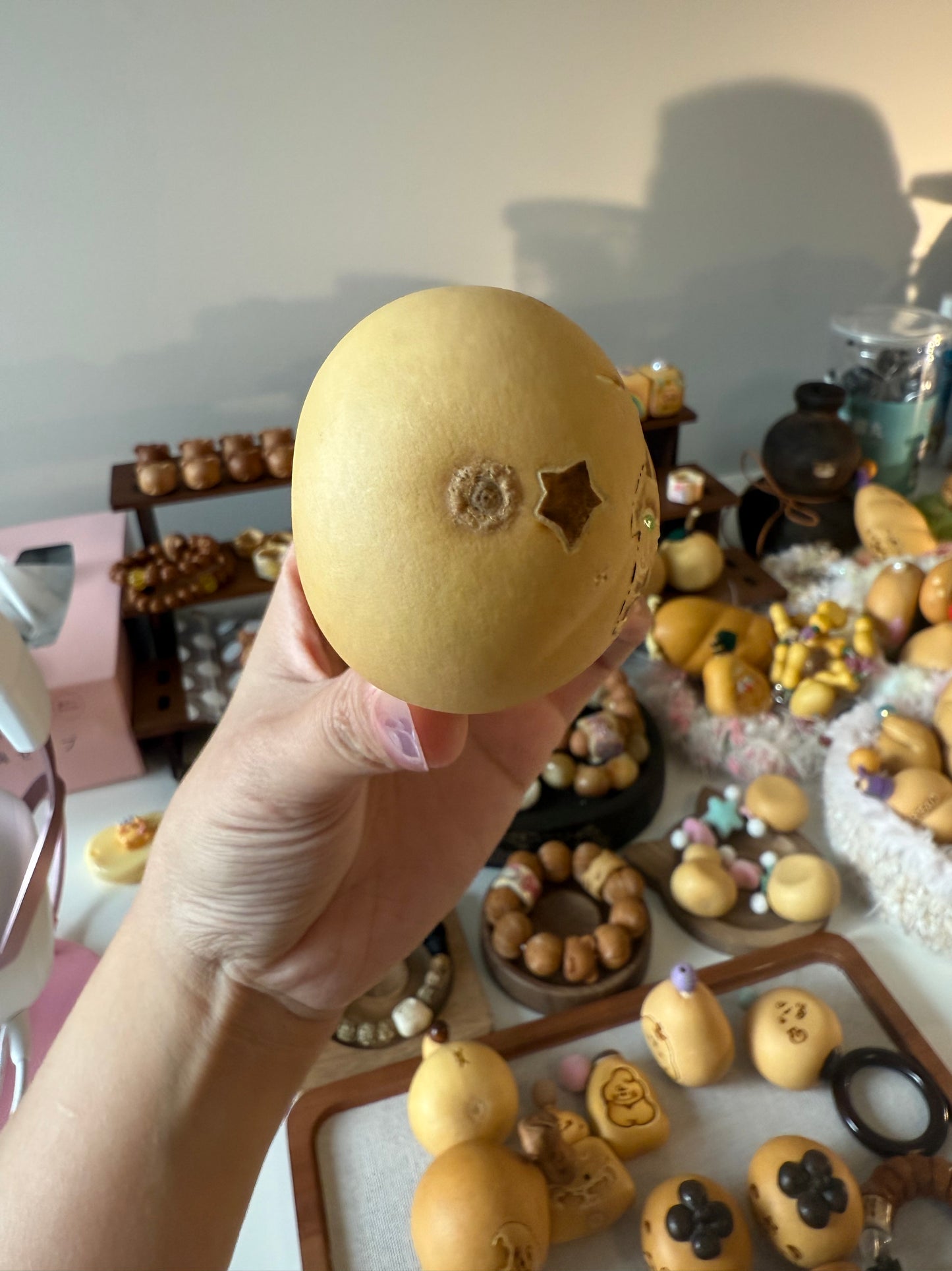 Hand-polished bread-shaped gourd โ warm color and soft texture, like freshly baked bread.