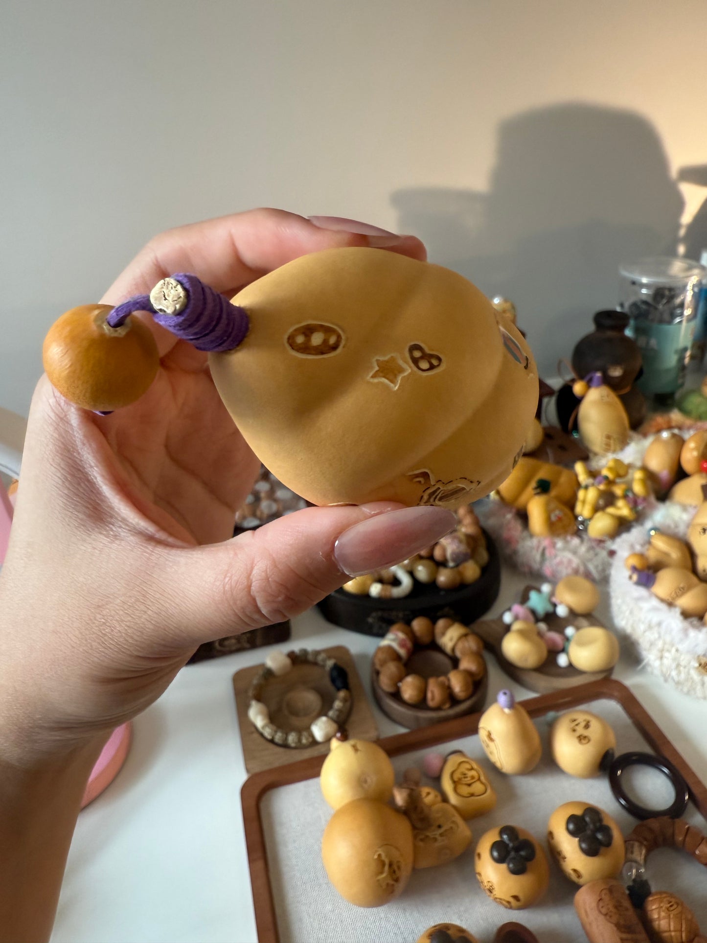 Hand-polished bread-shaped gourd โ warm color and soft texture, like freshly baked bread.