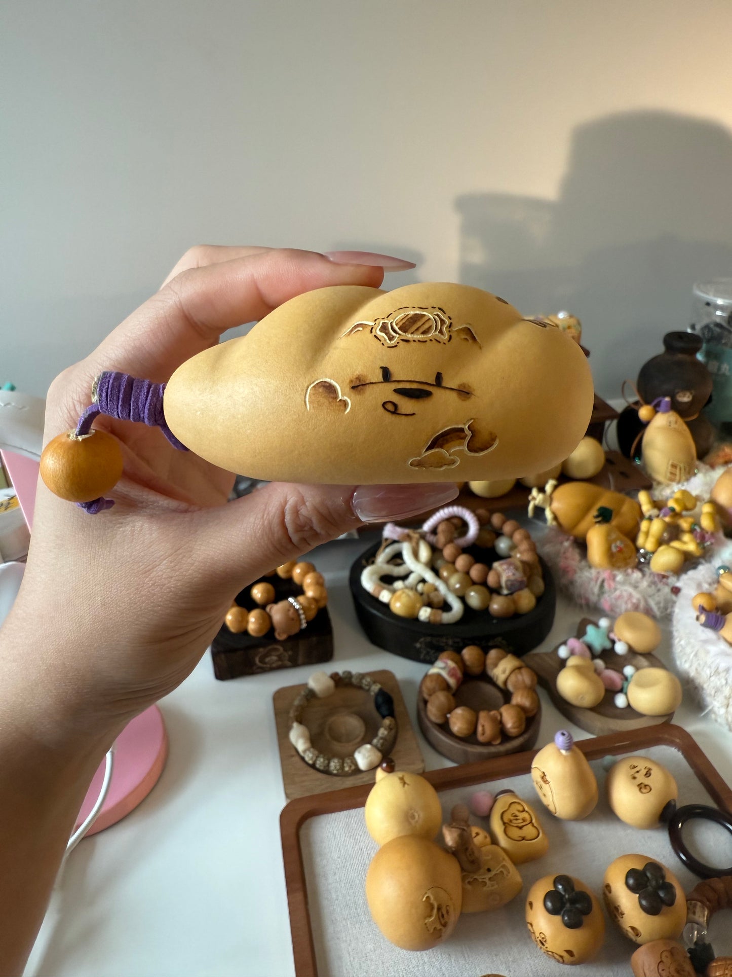 Hand-polished bread-shaped gourd โ warm color and soft texture, like freshly baked bread.