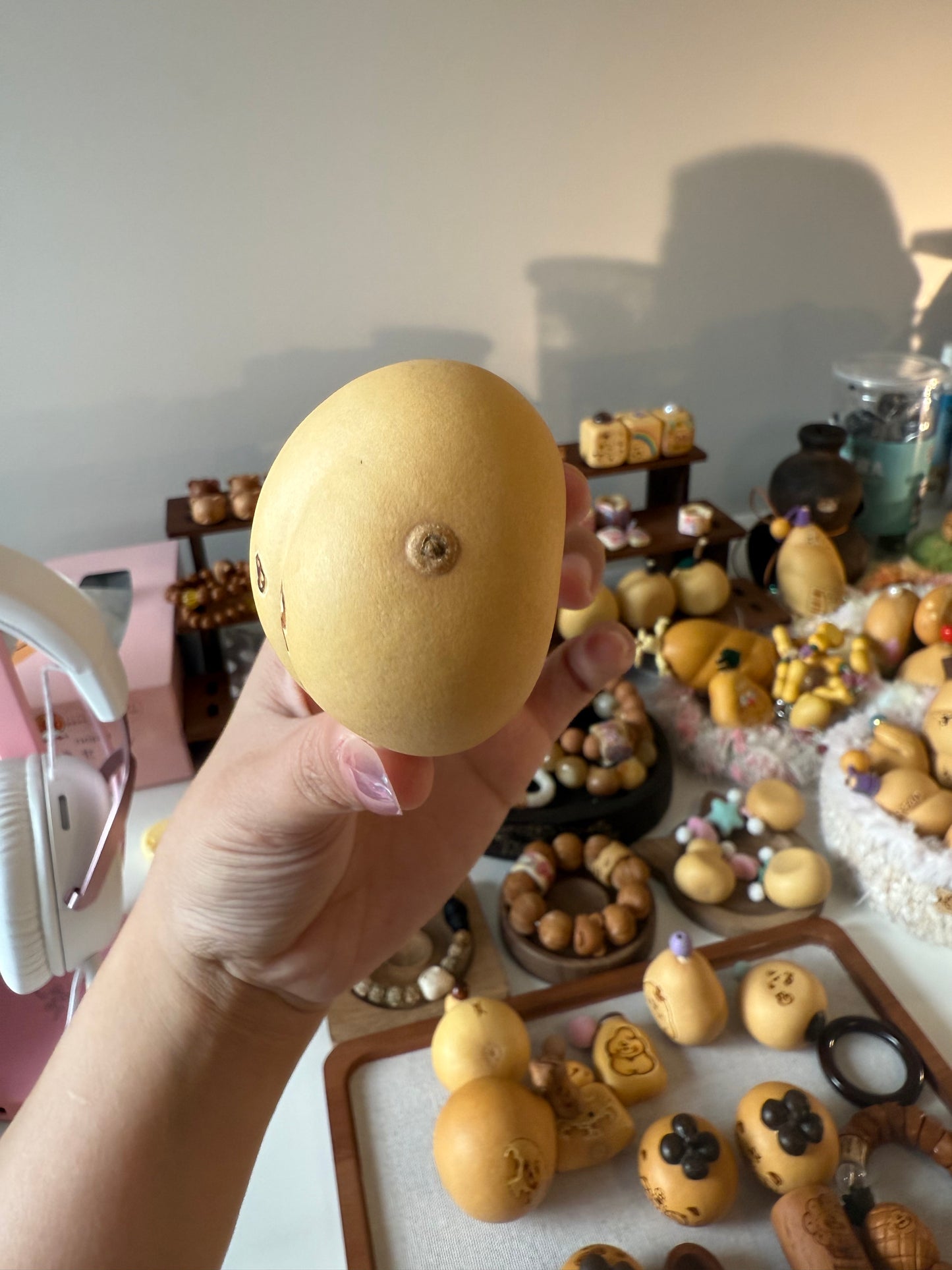 Hand-polished bread-shaped gourd โ warm color and soft texture, like freshly baked bread.