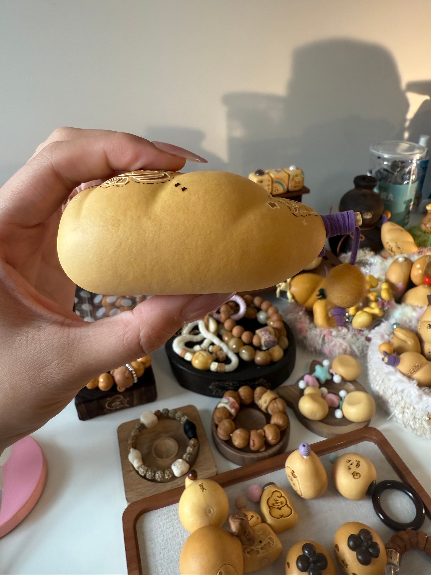 Hand-polished bread-shaped gourd — warm color and soft texture, like freshly baked bread.