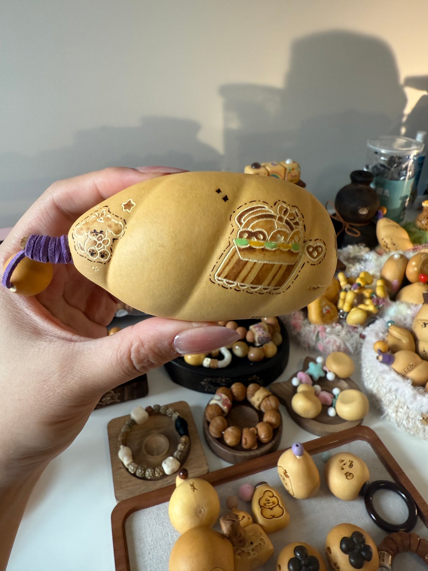 Hand-polished bread-shaped gourd — warm color and soft texture, like freshly baked bread.