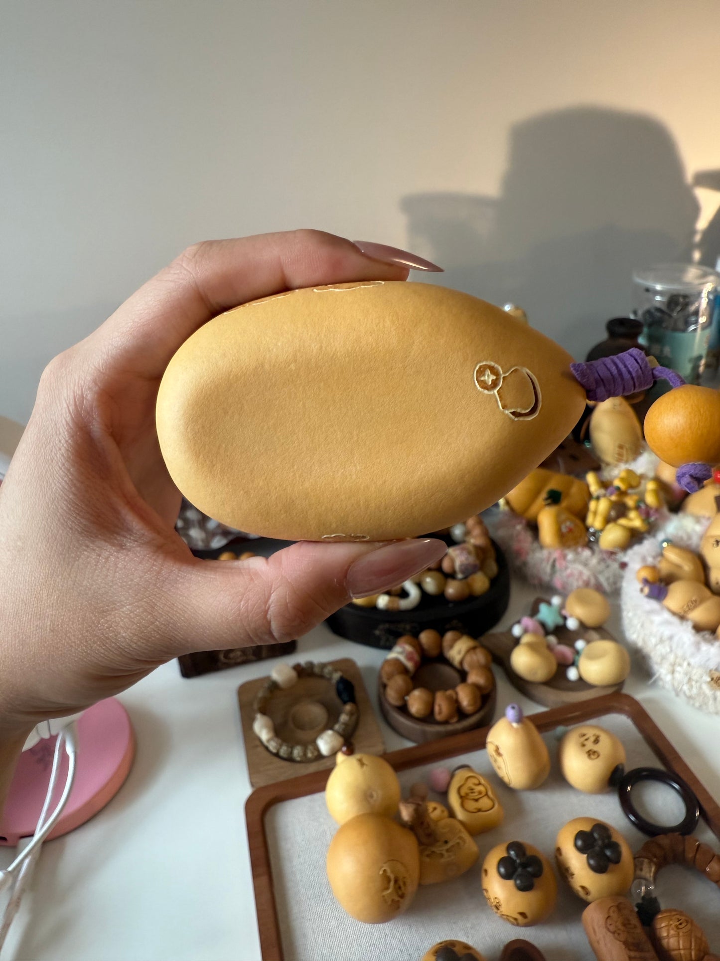 Hand-polished bread-shaped gourd — warm color and soft texture, like freshly baked bread.