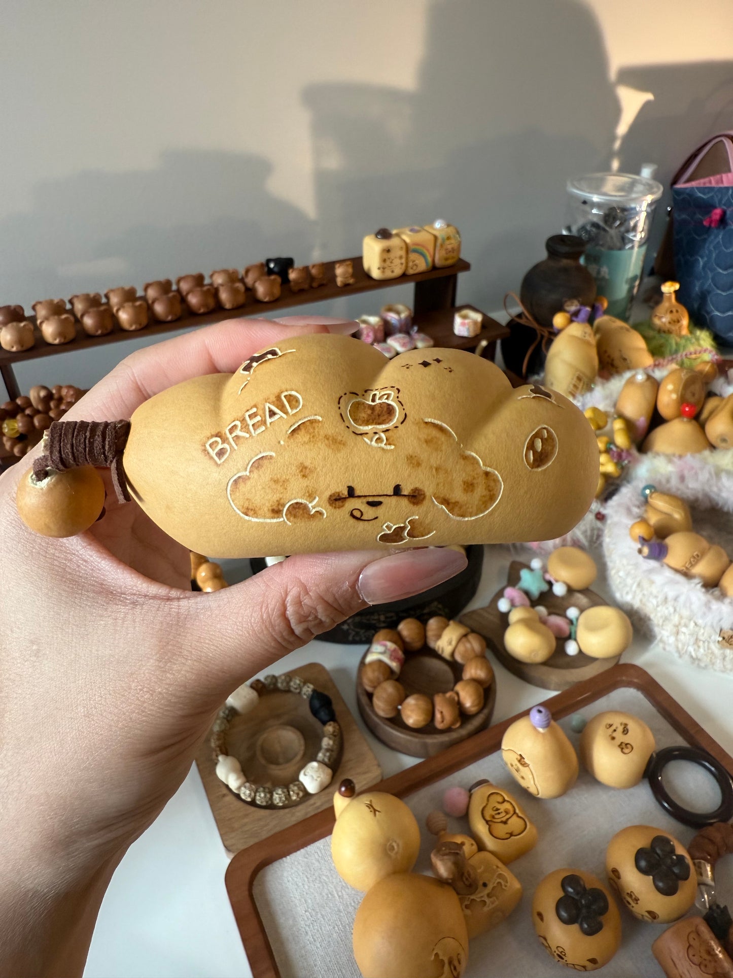 Hand-polished bread-shaped gourd — warm color and soft texture, like freshly baked bread.