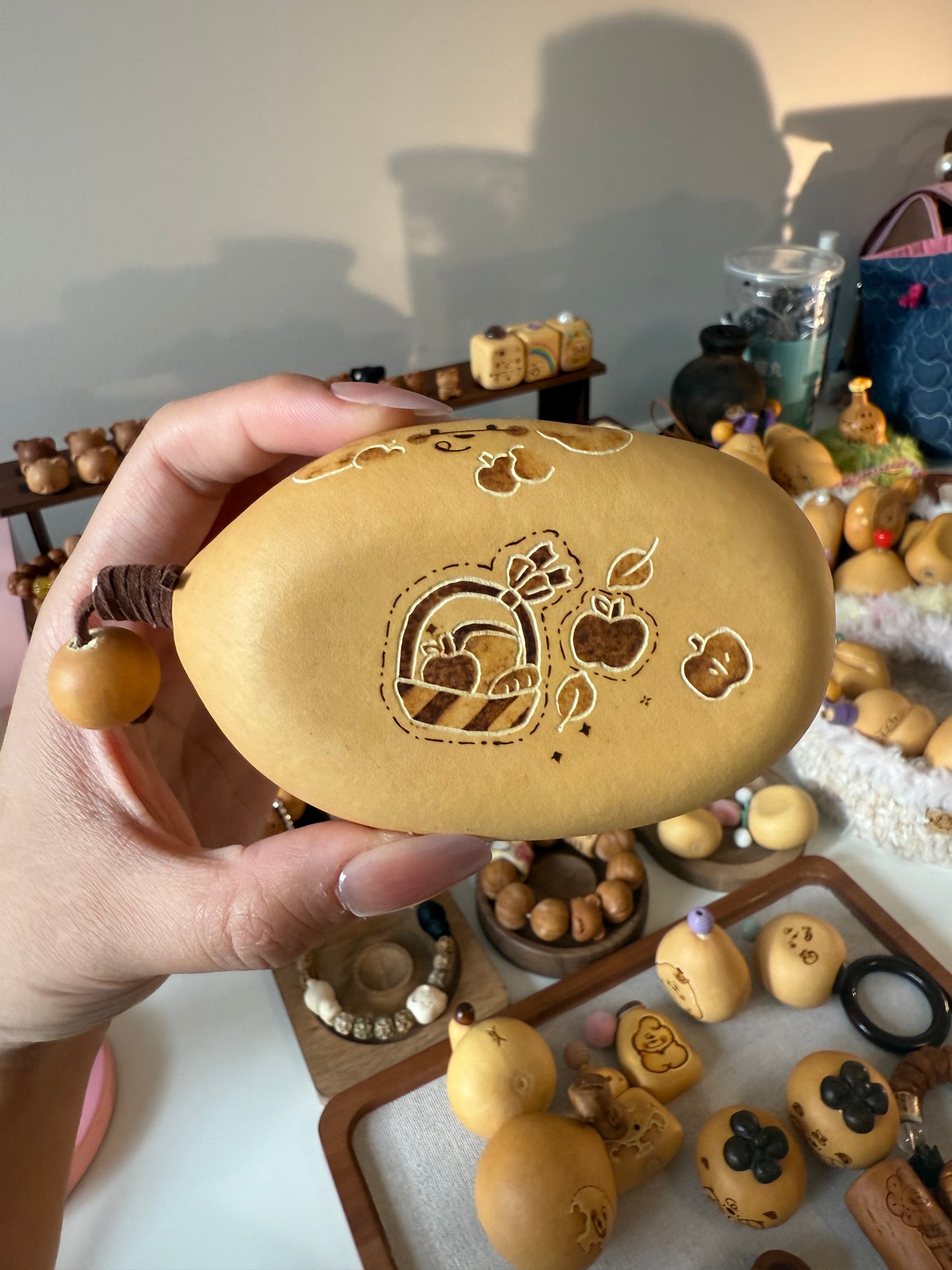 Hand-polished bread-shaped gourd — warm color and soft texture, like freshly baked bread.